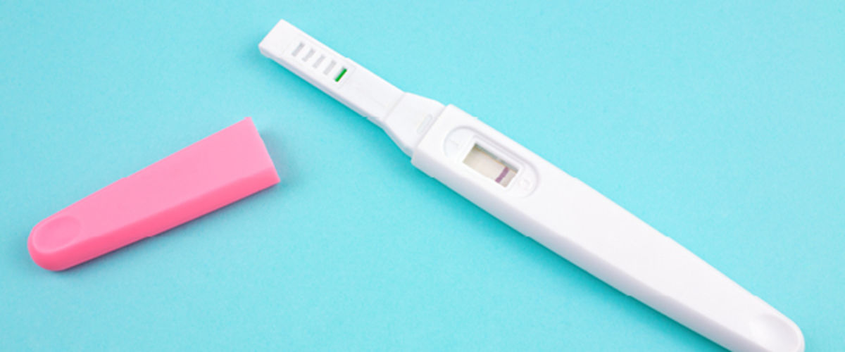 Taking a pregnancy test and the tell-tale signs you’re expecting